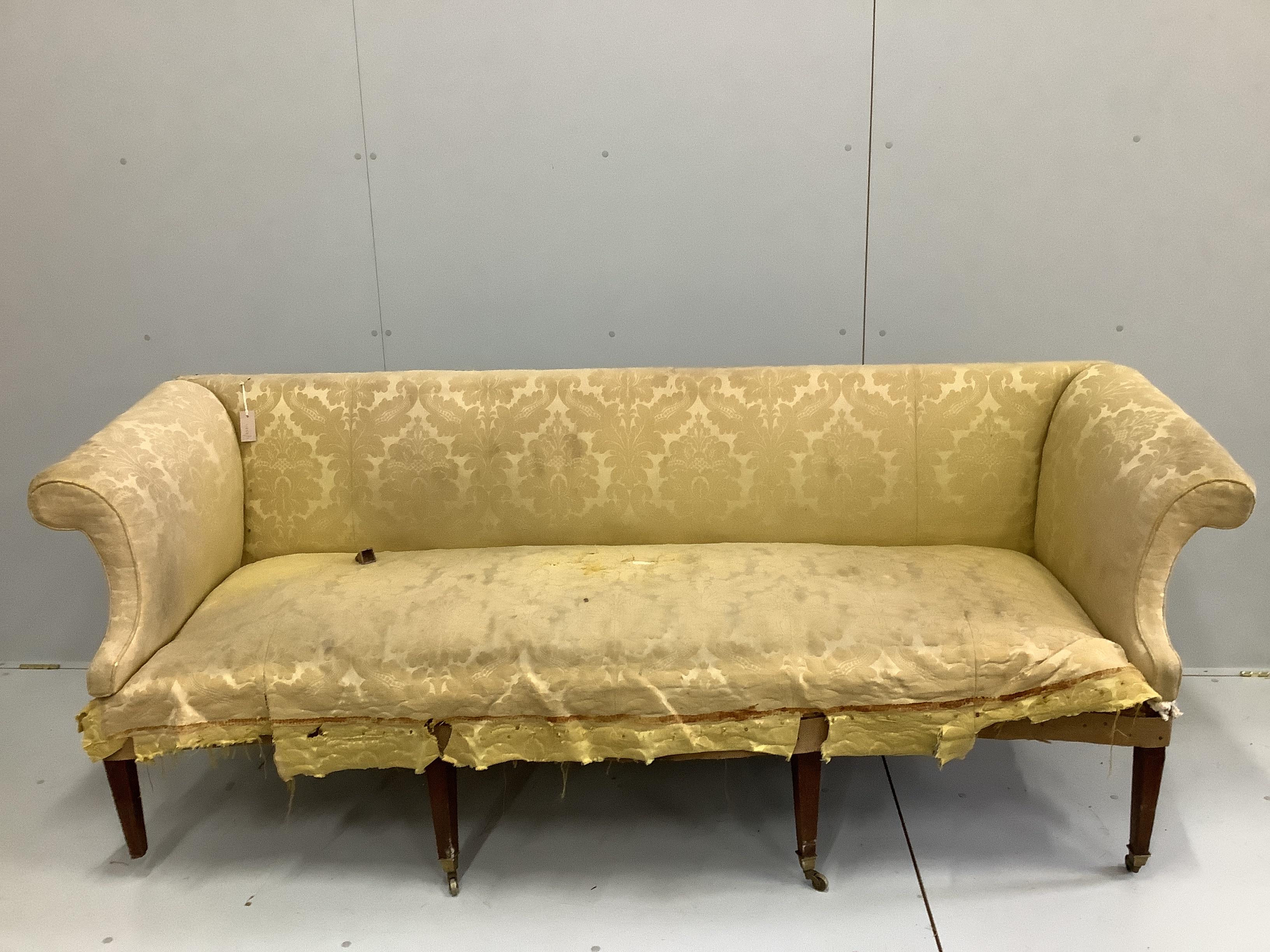 A George III sectional campaign settee on square tapered mahogany legs width 220cm, depth 76cm, height 84cm.